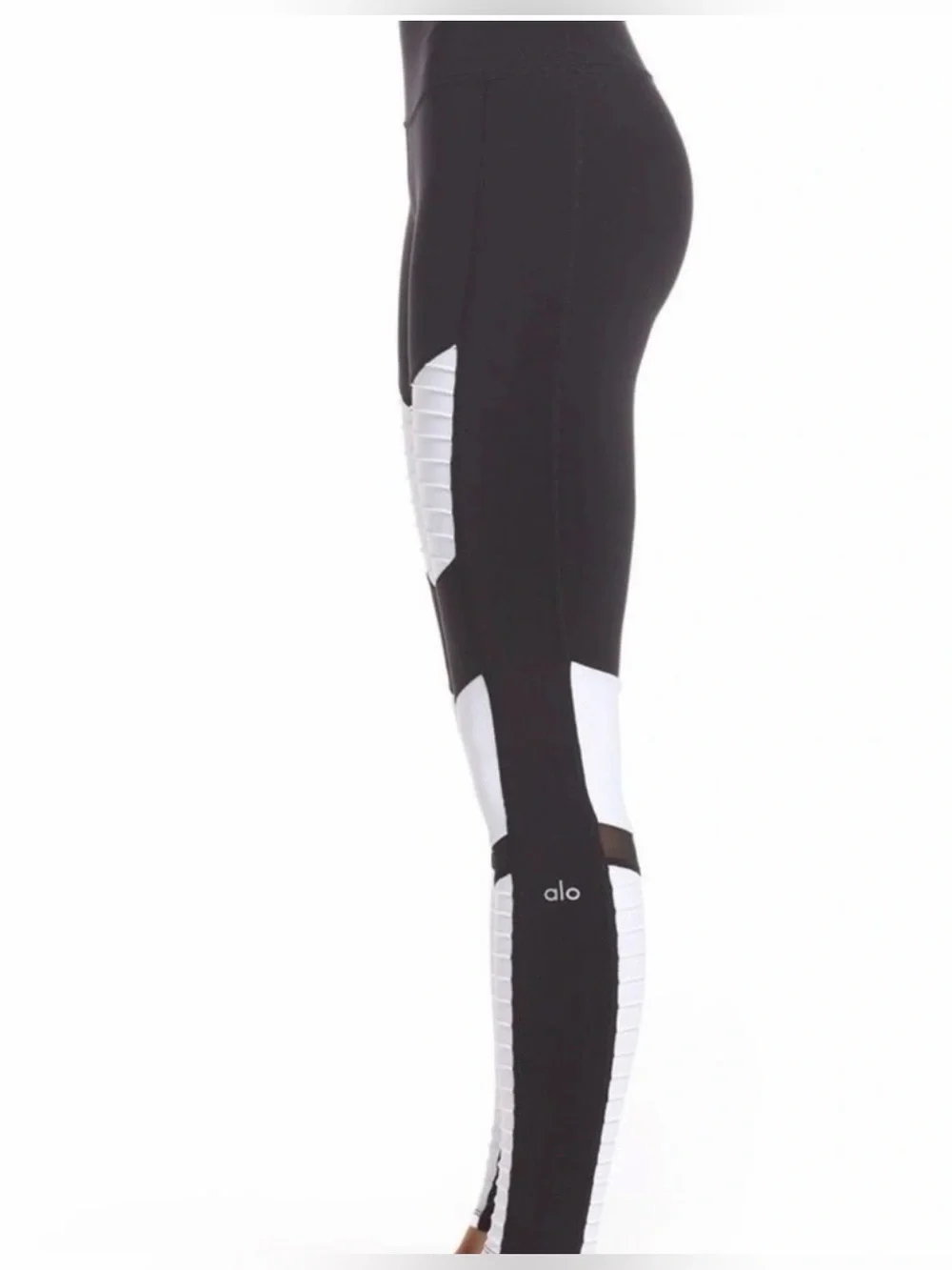 ALO Yoga Moto Leggings in a black and white